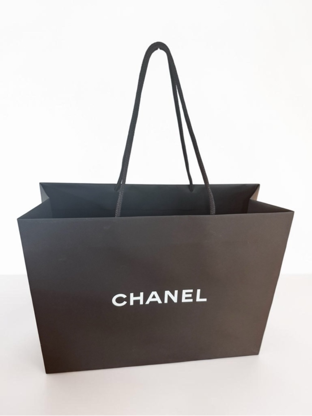 CHANEL Black Shopping Tote with White Camellia - Picture 2 of 2